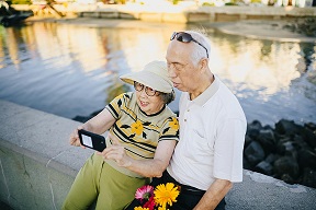 older couple taking selfie